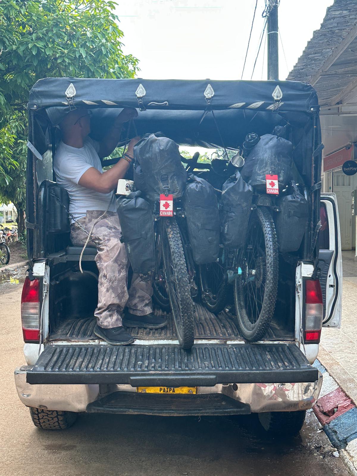 PL and Kristen's bike in the back of a truck